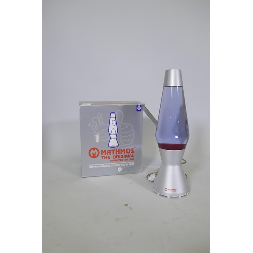 7 - A Mathmos Astro violet/red lava lamp in original box, 44cm high