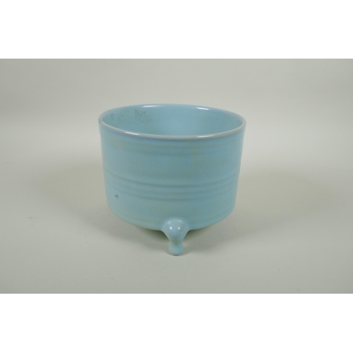 73 - A Chinese Ru ware style ribbed censer on tripod feet, 18cm diameter