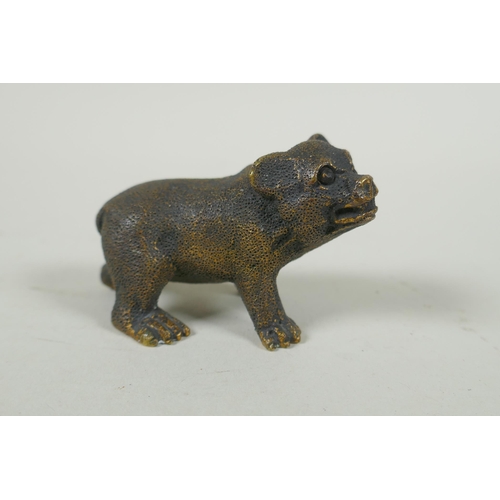 74 - An antique bronze figure of a bear cub, 7cm long