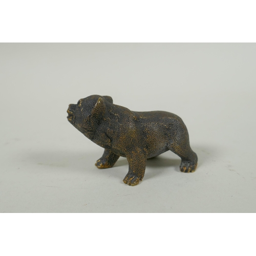 74 - An antique bronze figure of a bear cub, 7cm long