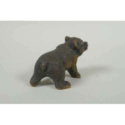 74 - An antique bronze figure of a bear cub, 7cm long