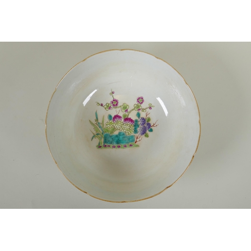 75 - A C19th Chinese famille rose porcelain bowl with lobed rim, decorated with birds amongst asiatic flo... 