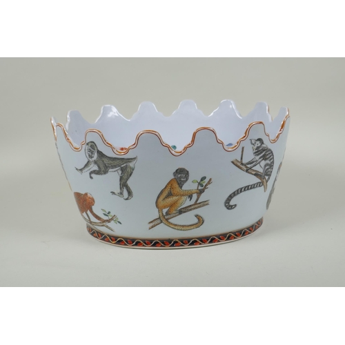 76 - An early C20th Chinese Republic polychrome porcelain Monteith bowl, decorated with monkeys, goldfish... 