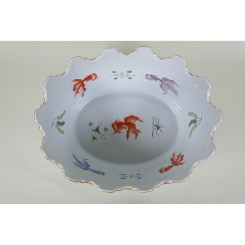 76 - An early C20th Chinese Republic polychrome porcelain Monteith bowl, decorated with monkeys, goldfish... 