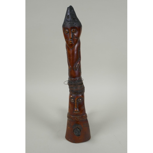 79 - An early C20th African carved bone Shamanic axe, with figural decoration, possibly Yoruba tribe, 33c... 