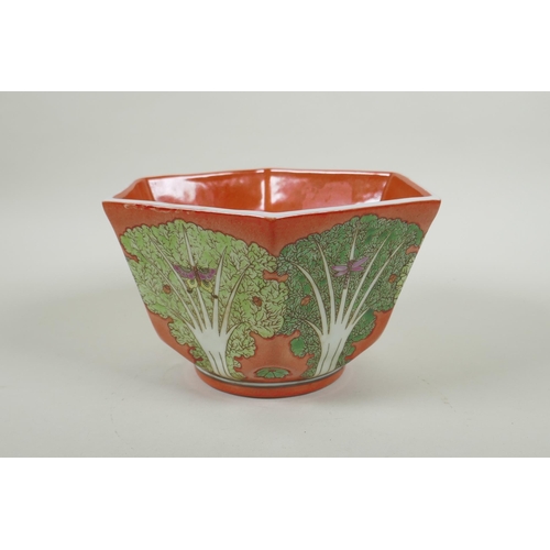 81 - A Chinese coral red ground porcelain bowl of hexagonal form, with polychrome enamel decoration of ca... 