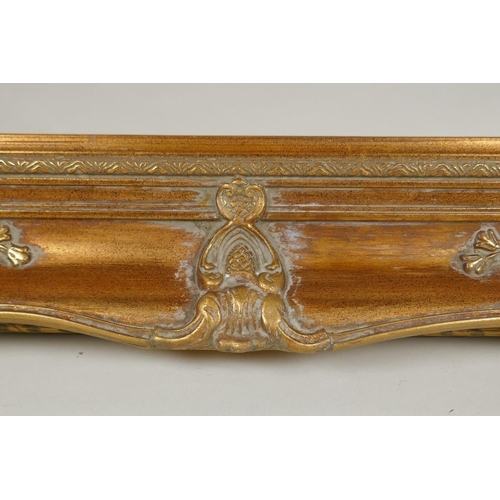 811 - A C20th gilt picture frame with scroll and floret decoration, rebate 51 x 41cm