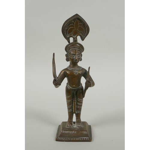 82 - An antique Indian bronze figure, with bow and short sword/septre, 19cm high