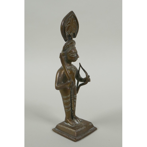 82 - An antique Indian bronze figure, with bow and short sword/septre, 19cm high