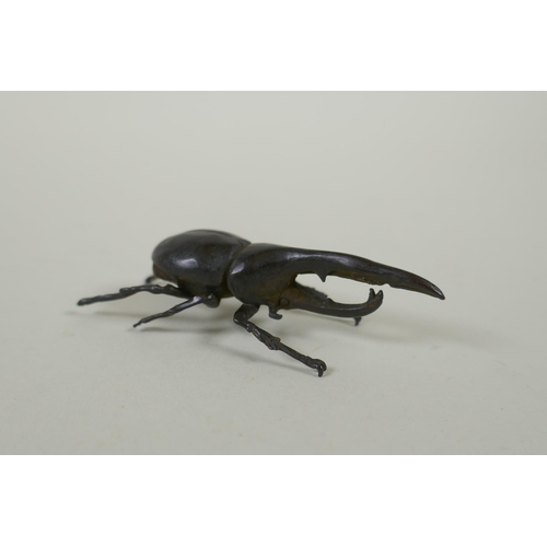 86 - A Japanese style bronze okimono hercules beetle, 7cm 