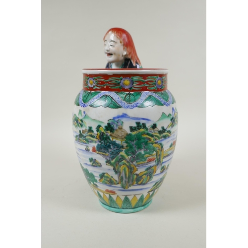 95 - A Japanese Kutani porcelain vase with a figure, the vase decorated with a riverside landscape, marke... 