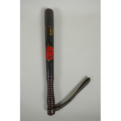 97 - An antique Manchester Special Constabulary turned wood police baton, dated 1916-1919, and another an... 