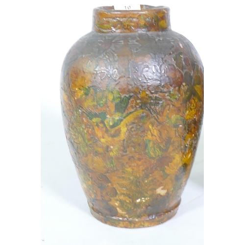 10 - A pair of C19th terracotta jars with decoupage scrapwork decoration, 30cm high