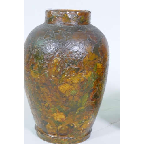 10 - A pair of C19th terracotta jars with decoupage scrapwork decoration, 30cm high