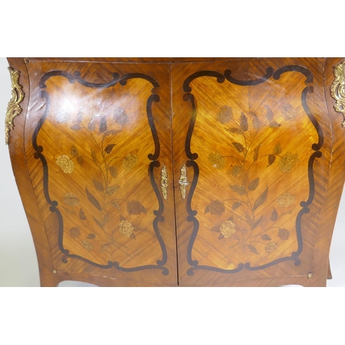 1001 - A C19th French marquetry inlaid bombe shaped two door cabinet with breccia marble top and ormolu mou... 