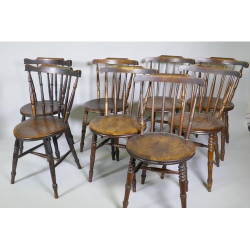 1006 - A harlequin set of eight Victorian penny kitchen chairs with spindle backs