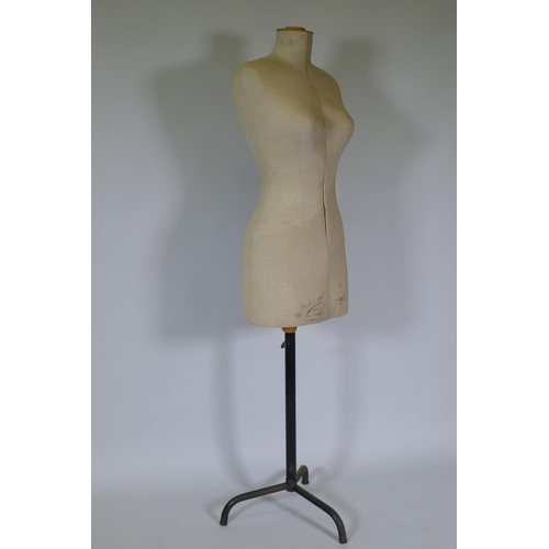 1008 - A vintage French adjustable tailor's dummy, 146cm high