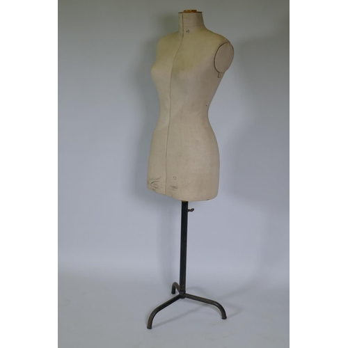 1008 - A vintage French adjustable tailor's dummy, 146cm high