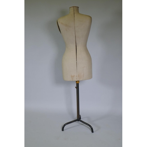 1008 - A vintage French adjustable tailor's dummy, 146cm high