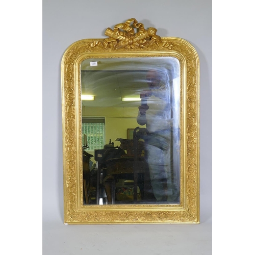 1009 - A C19th French giltwood and composition wall mirror with carved crest and original glass, 79 x 116cm