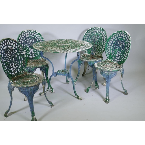 1015 - A painted aluminium Coalbrookdale style garden table and four chairs