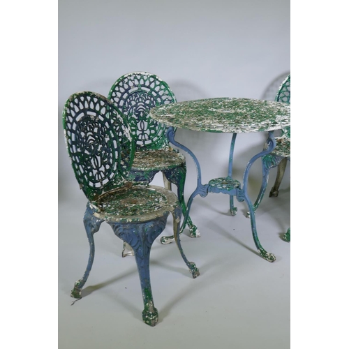 1015 - A painted aluminium Coalbrookdale style garden table and four chairs