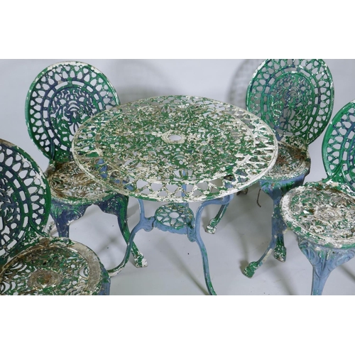 1015 - A painted aluminium Coalbrookdale style garden table and four chairs