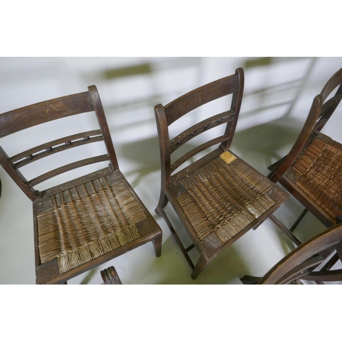 1024 - A pair of Regency mahogany bar back elbow chairs with reeded decoration and four similar standard ch... 