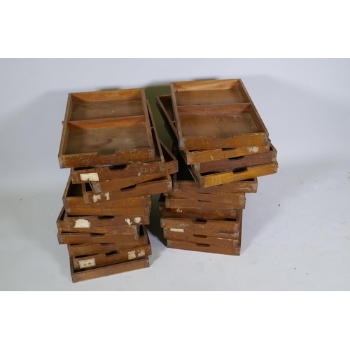 1031 - A set of twenty four mahogany front slide drawers, 51 x 3 x 5cm