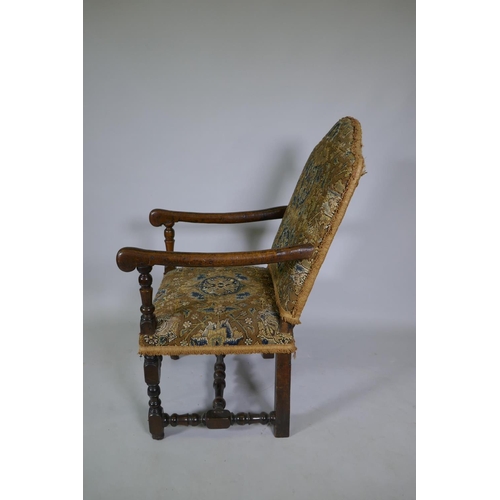 1033 - A C17th William and Mary walnut humpback open armchair on turned supports, circa 1690, historic repa... 