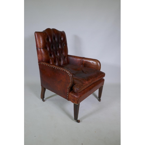 1034 - A Cornelius V Smith small Victorian button back leather armchair, stamped CVS, AF