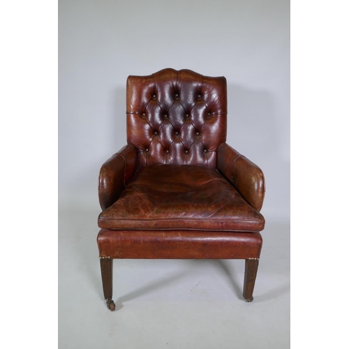 1034 - A Cornelius V Smith small Victorian button back leather armchair, stamped CVS, AF