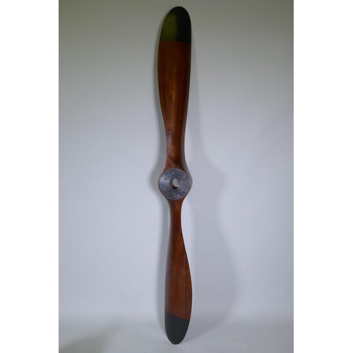 1035 - A decorative wooden propeller, 196cm long