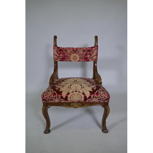 1038 - An C18th/C19th Italian carved walnut and parcel gilt side chair, raised on hoof feet