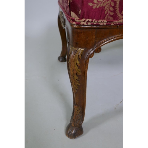 1038 - An C18th/C19th Italian carved walnut and parcel gilt side chair, raised on hoof feet