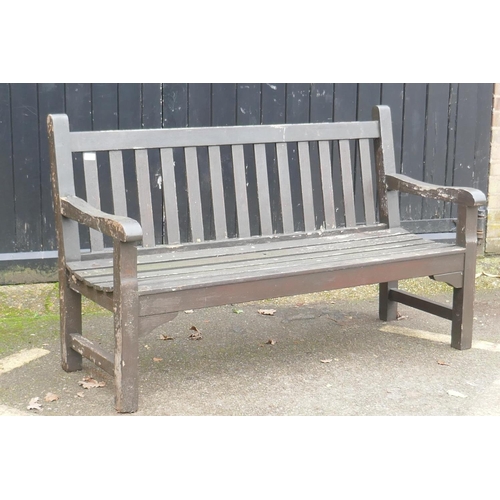 1044 - A varnished teak garden bench, 150cm wide