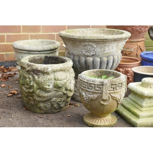 1046 - A quantity of terracotta and concrete garden planters, a chimney pot/pedestal, 53cm high, etc