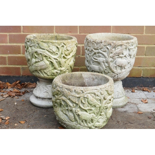 1047 - Three concrete garden planters, 24cm high without stands