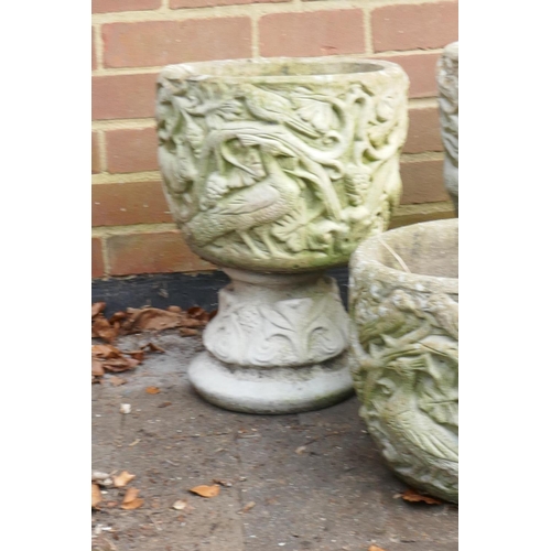 1047 - Three concrete garden planters, 24cm high without stands