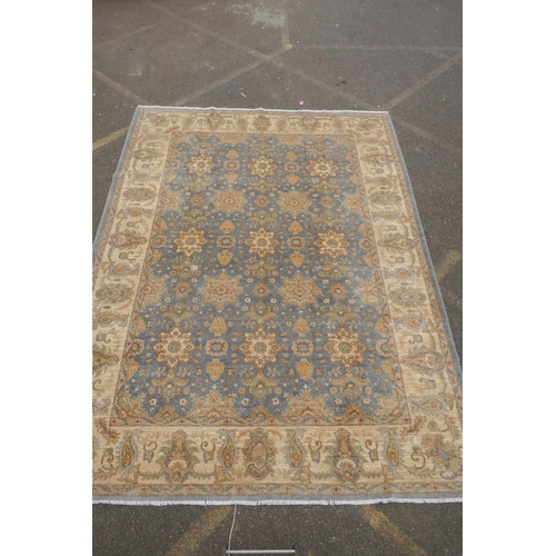 1048 - A Persian pewter ground Sarouk Farahan carpet with an all over floral design and gold borders, 360 x... 