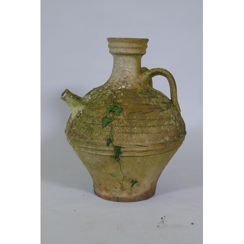 1049 - A terracotta oil jar, 54cm high