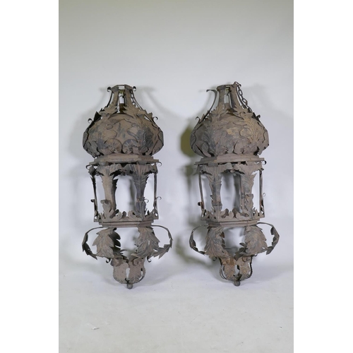 1056 - A large pair of metal lanterns, 118cm long