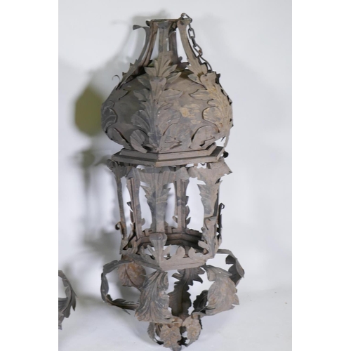 1056 - A large pair of metal lanterns, 118cm long