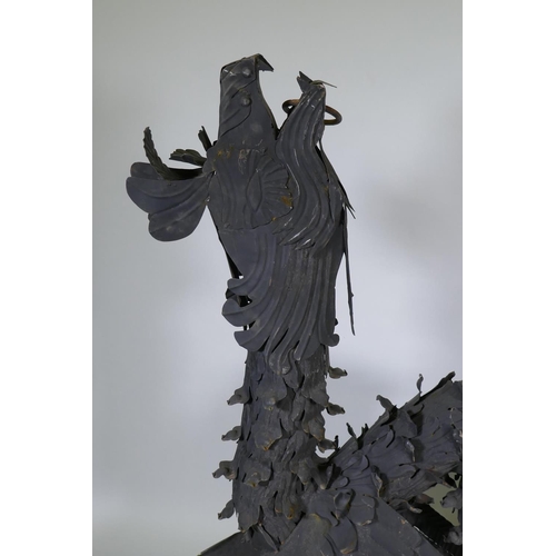 1057 - A pair of metal wall brackets in the form of dragons, 170 x 128cm, (associated with previous lot)