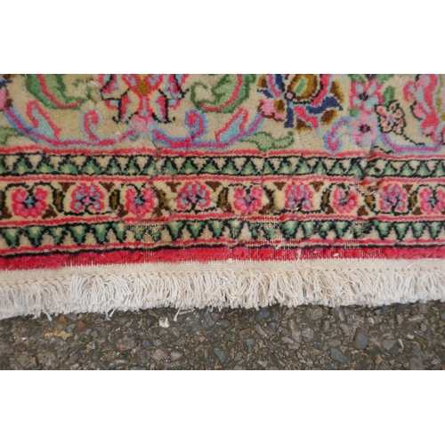 1059 - A very fine hand woven Persian Kashan rug with floral medallion design on a pink field, patched, 172... 