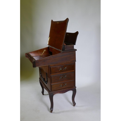 1062 - A Victorian mahogany Davenport, lift up top with fitted interior, fall front and three true and thre... 