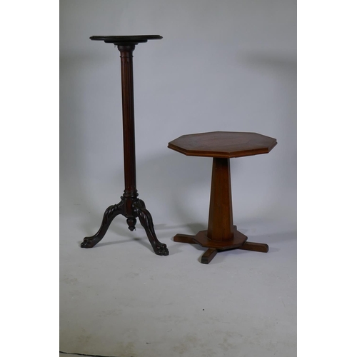 1066 - A Victorian mahogany torchere/jardiniere stand, raised on a fluted column with carved cabriole suppo... 