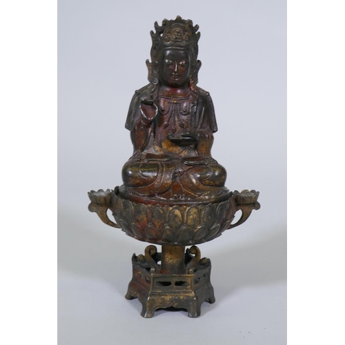 107 - A bronze censer, the cover with seated Buddha, on a lotus bowl, 23cm high