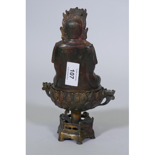 107 - A bronze censer, the cover with seated Buddha, on a lotus bowl, 23cm high