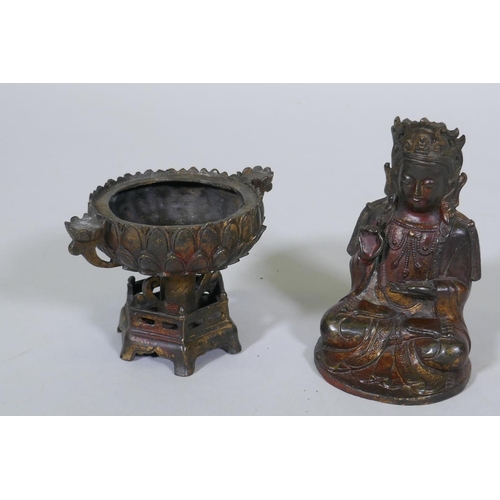 107 - A bronze censer, the cover with seated Buddha, on a lotus bowl, 23cm high